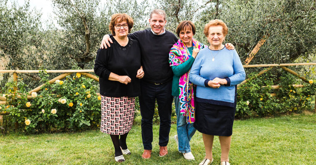 Chef Maurizio Bocchi pictured with Gabrielloni olive oil family members