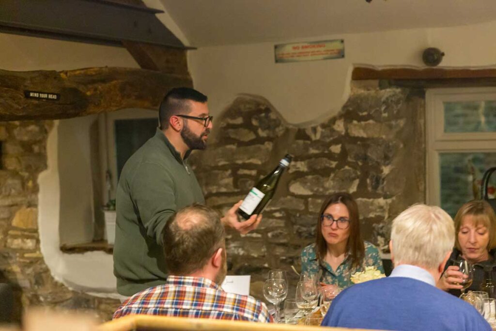 Dario Rinaldi from the Baglio Di Pianetto Estates in Sicily talking guests through the wine choices at La Locanda