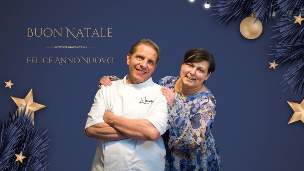 an image of the owners of Italian restaurant in Lancashire, La Locanda, Cinzia and Maurizio Bocchi, set on a festive background